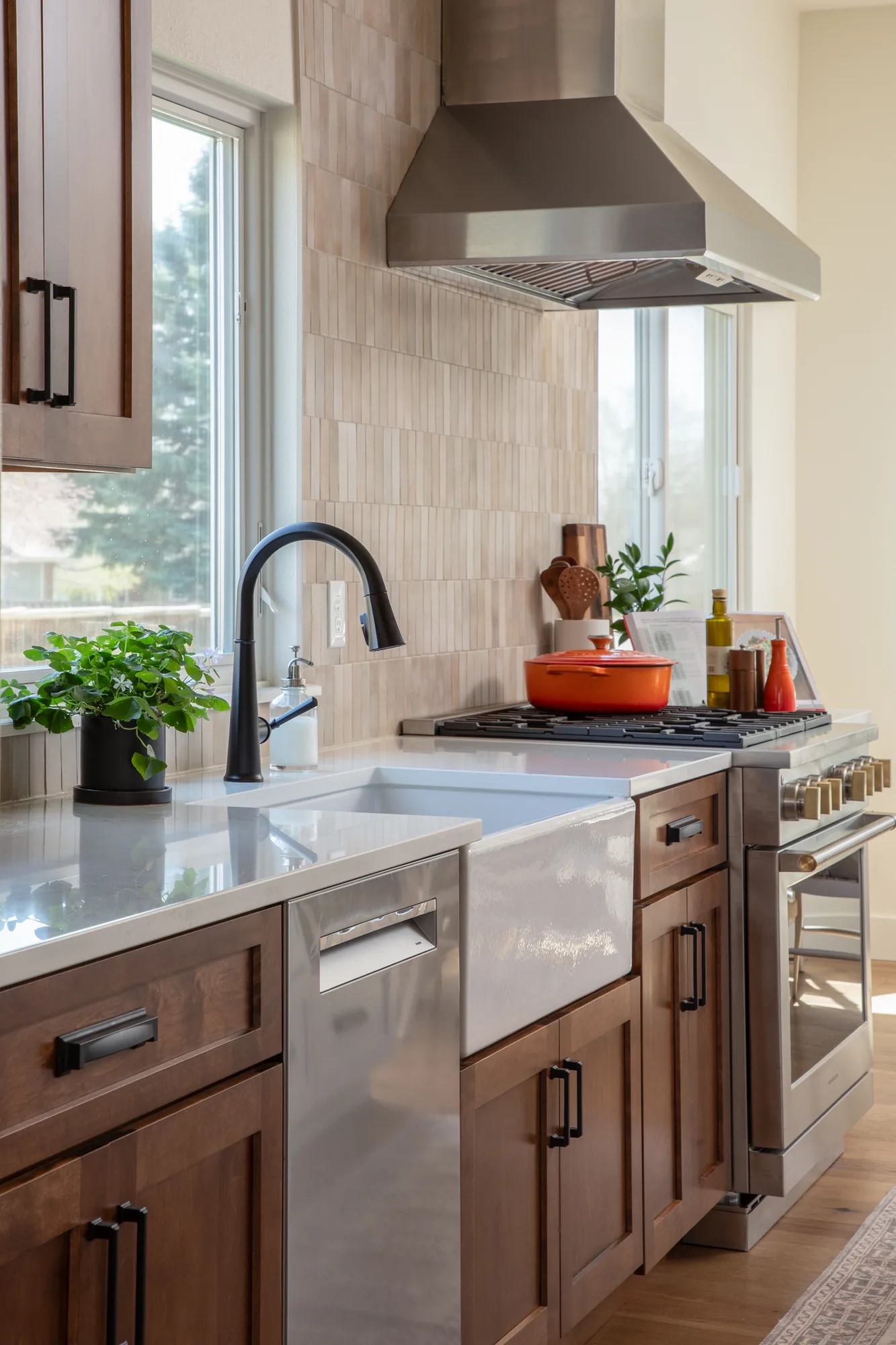 A refreshed kitchen with a farmhouse sink and updated fixtures